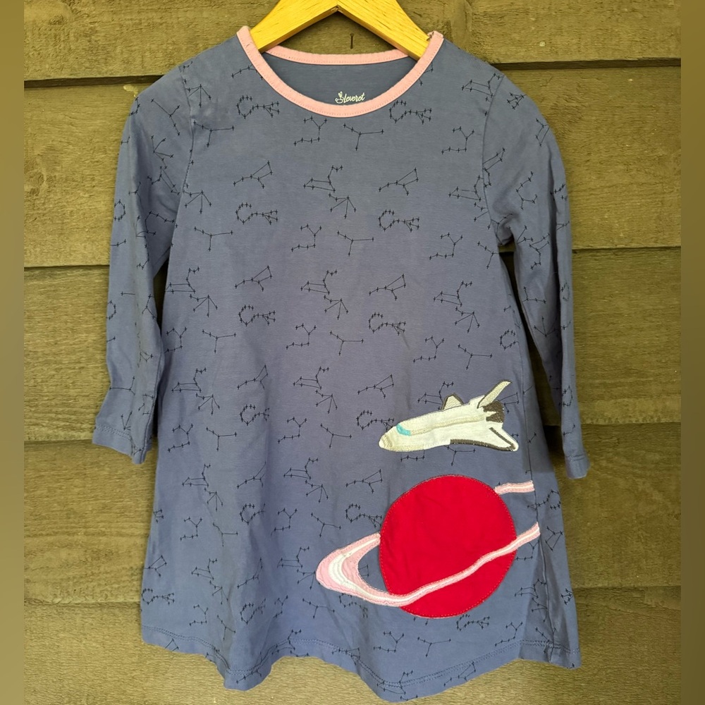 Leveret constellation dress with space shuttle, and planet appliqué